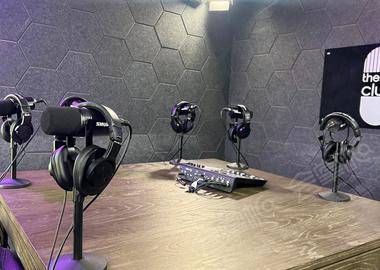 Private podcast studio suite for up to 8 guests